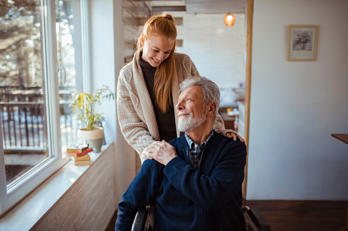 A daughter helps her father around the house